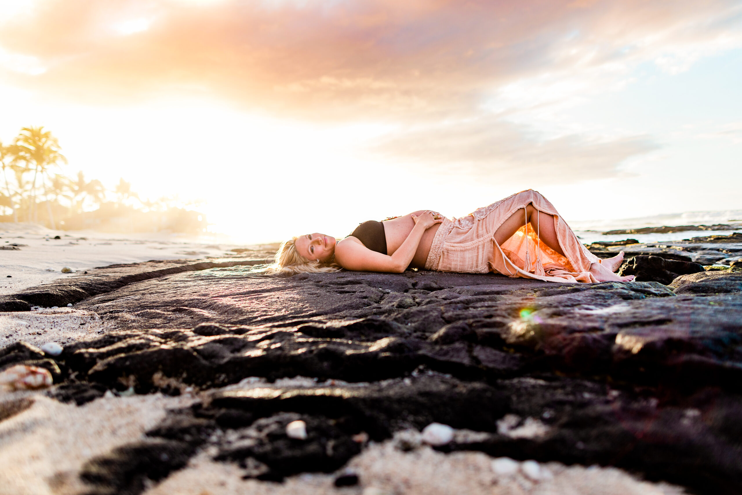 Maternity photos with mom to be at the Four Seasons Hualalai with Dawn Eicher Photography